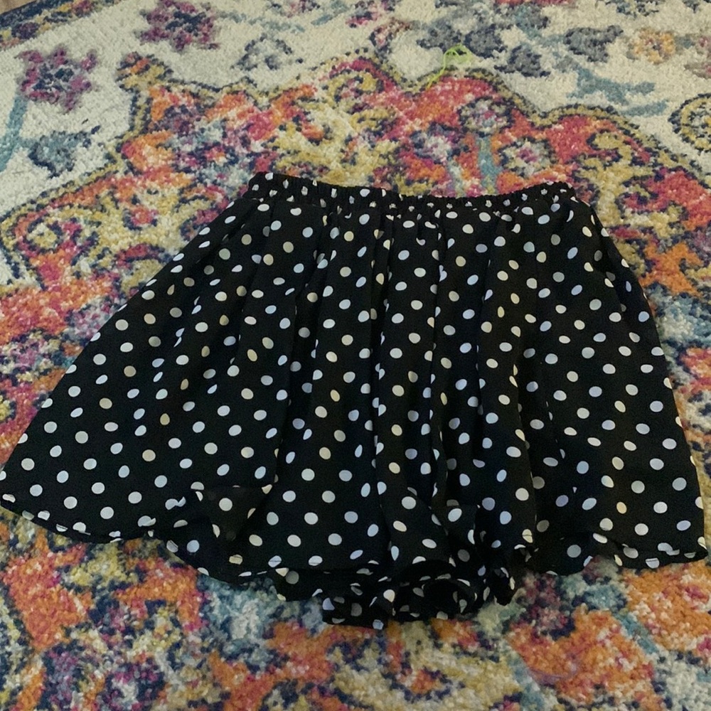 Black skirt with white polka dots